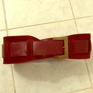 Leather and suede wide to tapered waist belt.